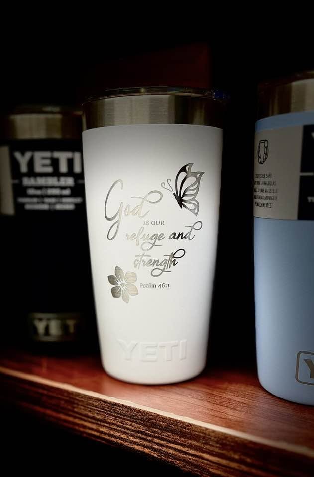 White insulated tumbler engraved with a butterfly and the message Give it to God and go to sleep